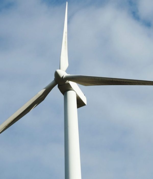 Low Angle View Of Wind Turbine Against Sky